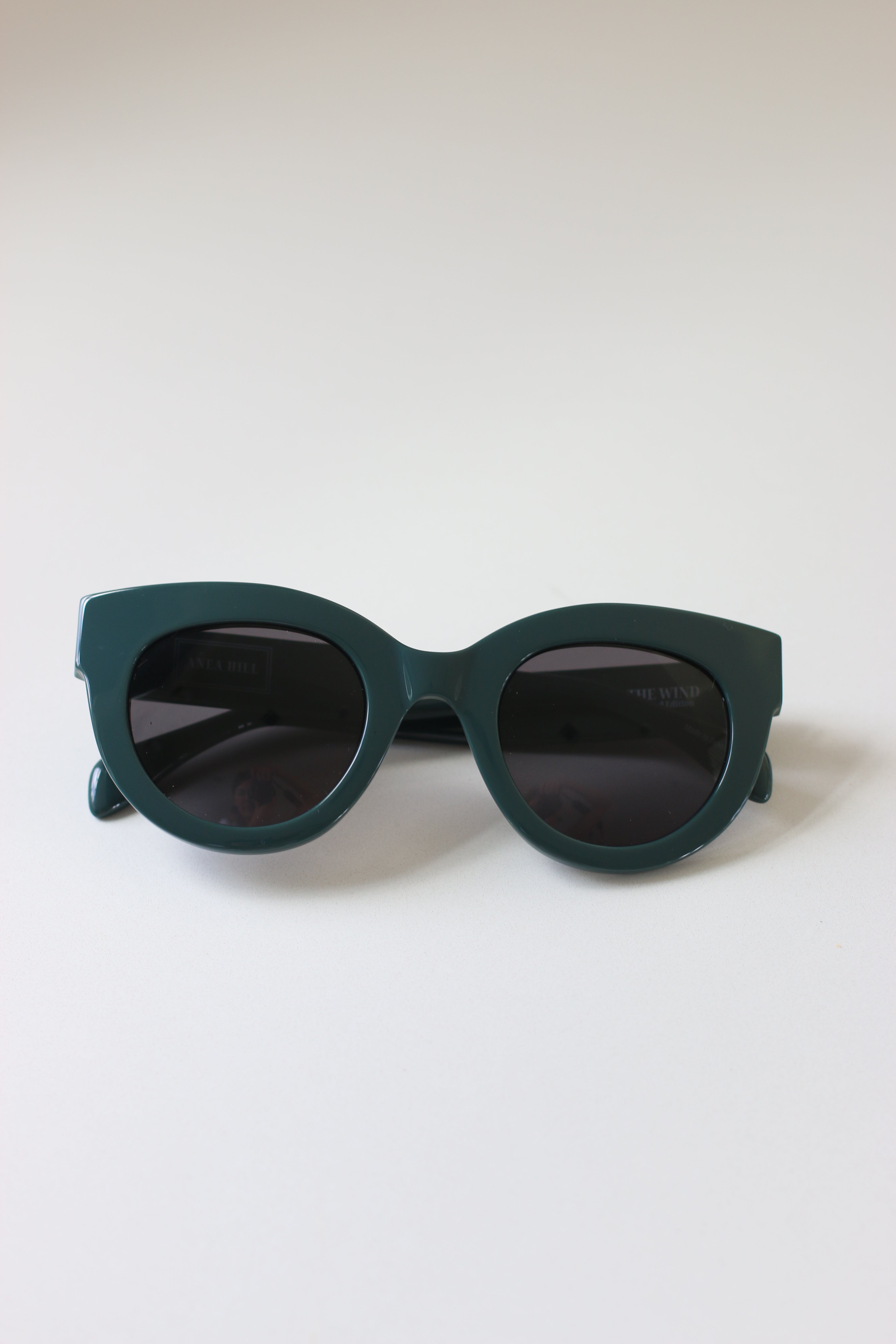 ANEA HILL The Wind is back! Handcrafted green acetate sunglasses with polarized lenses for timeless style.